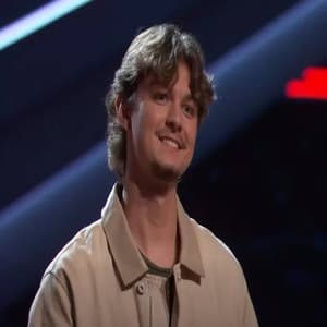 Evan James performing during The Voice Season 30 Blind Auditions.