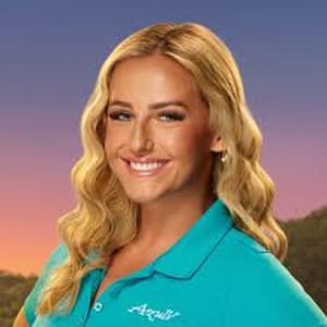 Jessenia Stidger posing for her official Below Deck Season 13 cast photograph